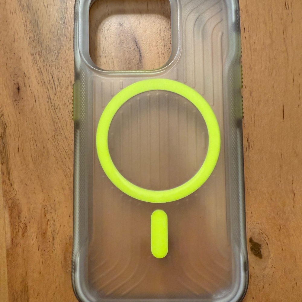 Transparent Tech21 iPhone 15 Pro Case with Neon Yellow Magsafe Ring